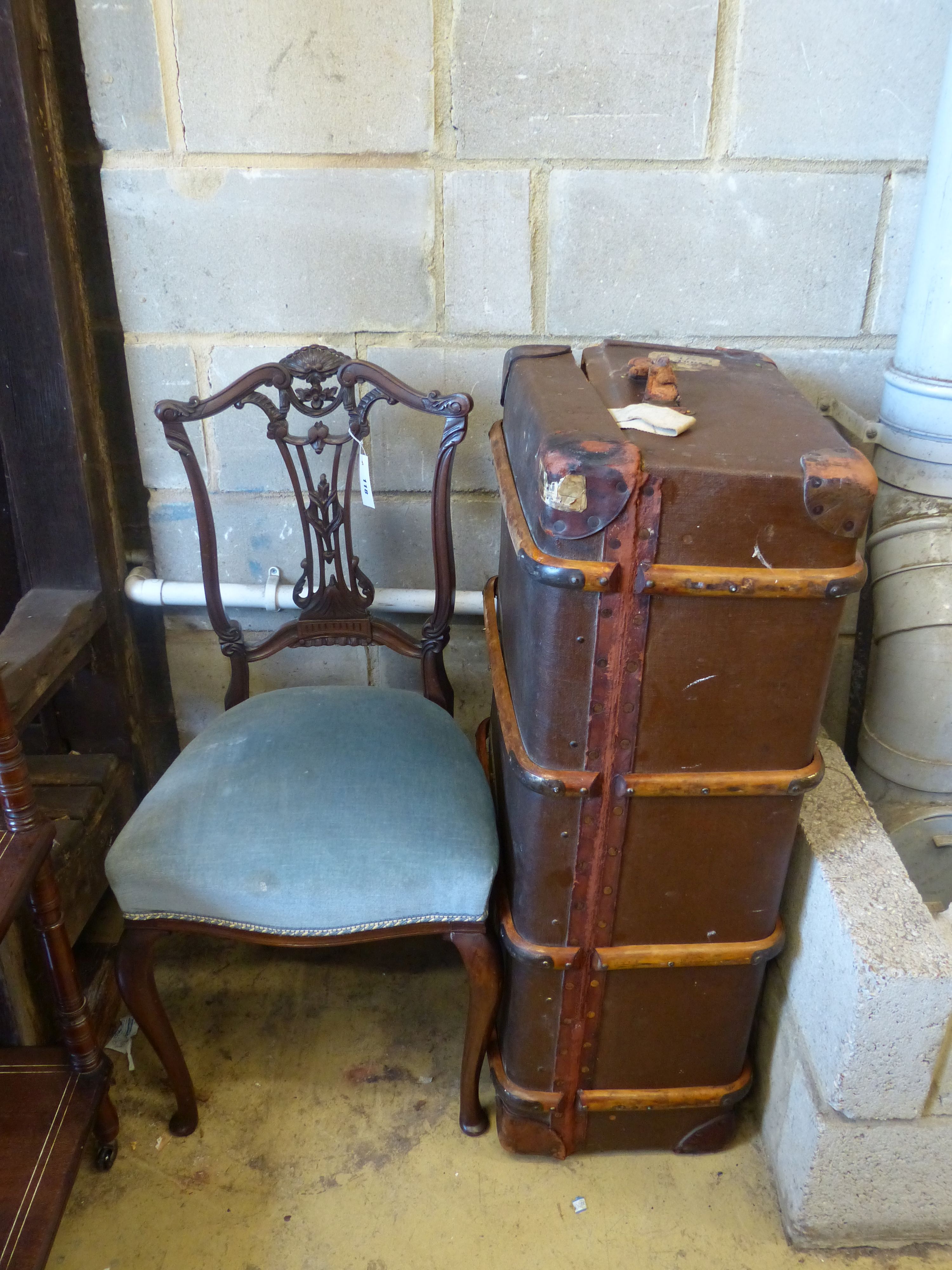 A vintage travelling trunk and Edwardian side chair
